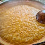 boiling-sugarcane-juice-to-make-garapa-sugar-cachaça-copper-pot-rapadura-boiling-sugarcane-juice-to-make-garapa-220713955